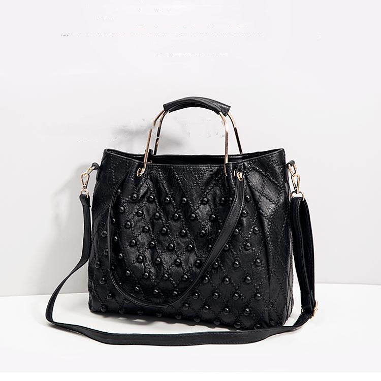 Soft Leather Diamond Rivet Handbag – Elegant, Edgy, and Chic