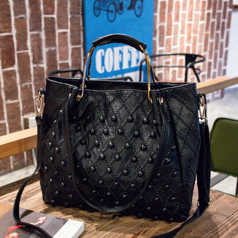 Soft Leather Diamond Rivet Handbag – Elegant, Edgy, and Chic
