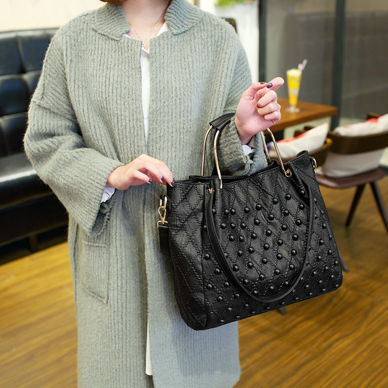 Soft Leather Diamond Rivet Handbag – Elegant, Edgy, and Chic